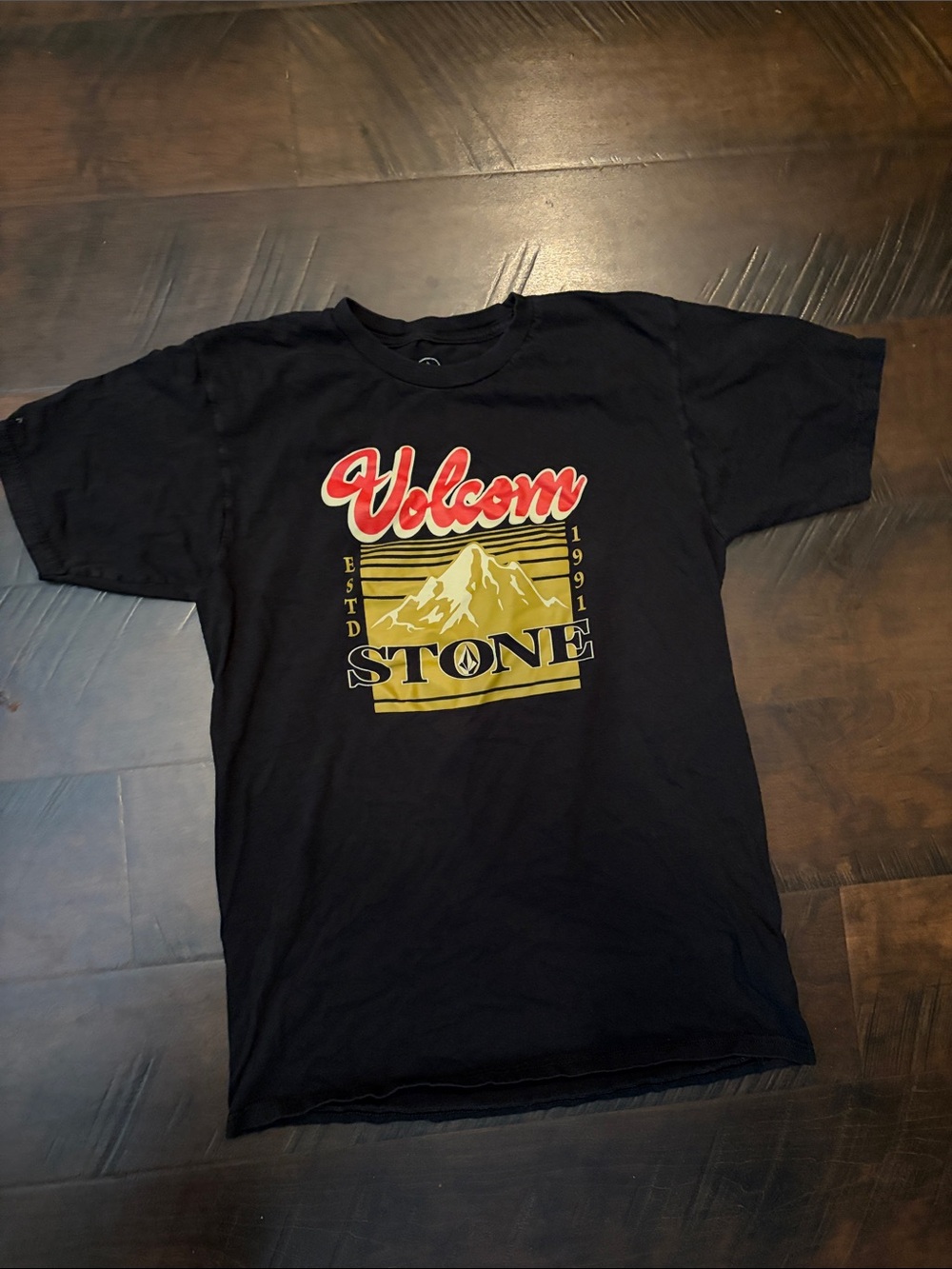 Volcom Black Tee with Red Script and Gold Mountain Graphic